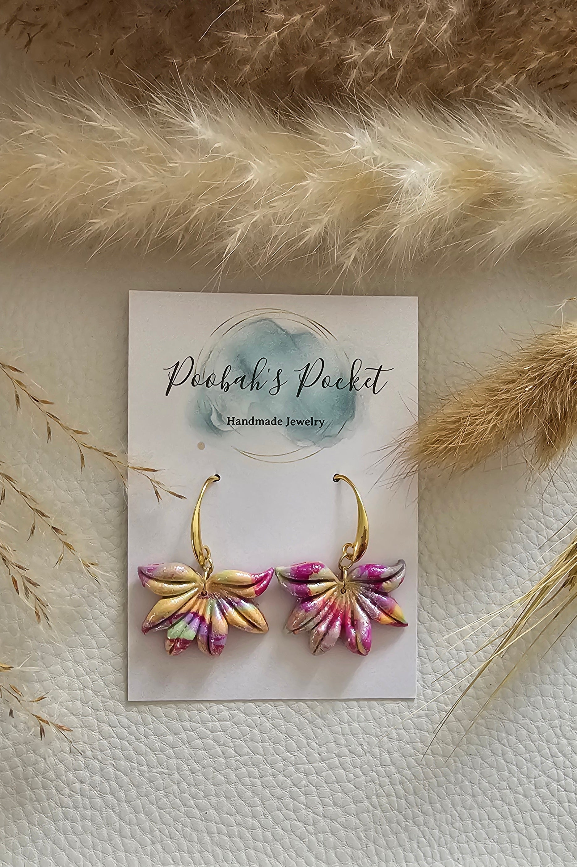 leaf shaped polymer clay earrings in pastel colors
