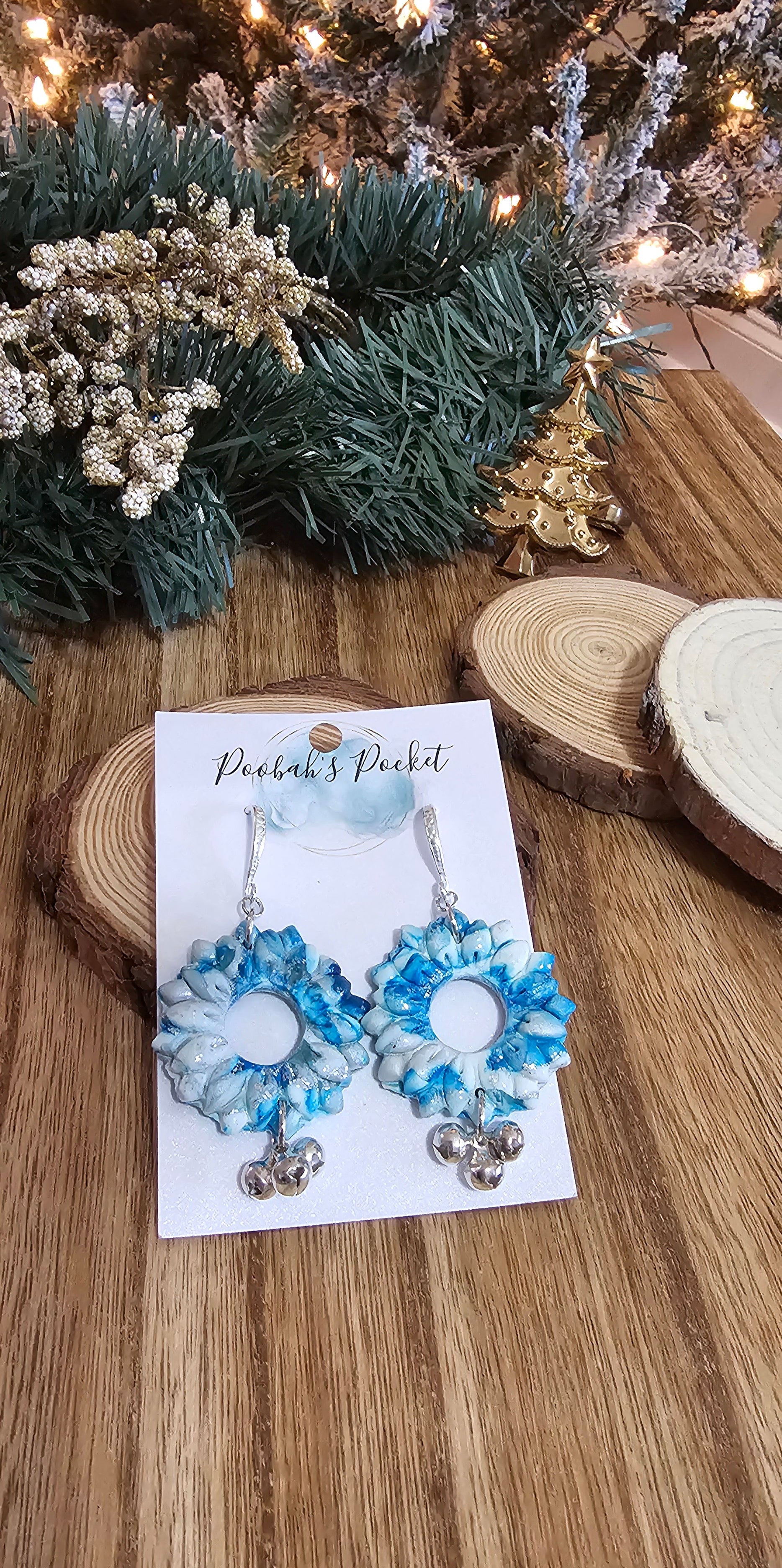 winter wonderland holiday wreath earrings with tiny bells hanging